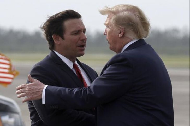 Trump ve DeSantis, Göçmen Tesisi Açılışında Birlik Mesajı Verdi - Trump ve DeSantis, Everglades’de bir araya gelerek yeni göçmen tesisinin hızlı açılışını ve siyasi barışı öne çıkardı.